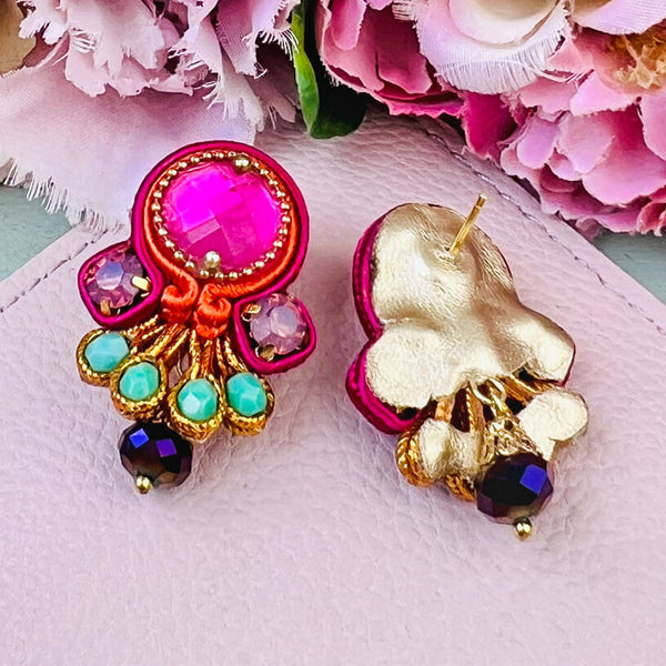 Farbenfrohe Statement-Ohrringe in Pink, Türkis und Violett