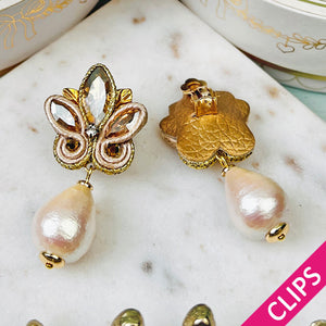 Schöne Soutache-Ohrclips in Champagner und Gold mit Baumwolltropfen