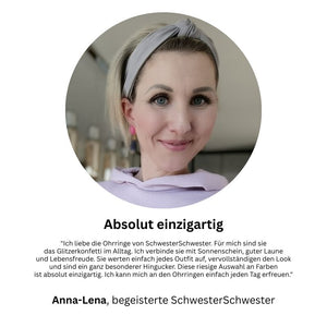 Pinkfarbene Ohrstecker mit glitzerndem dunkelblauen Tropfen von AmuseToi
