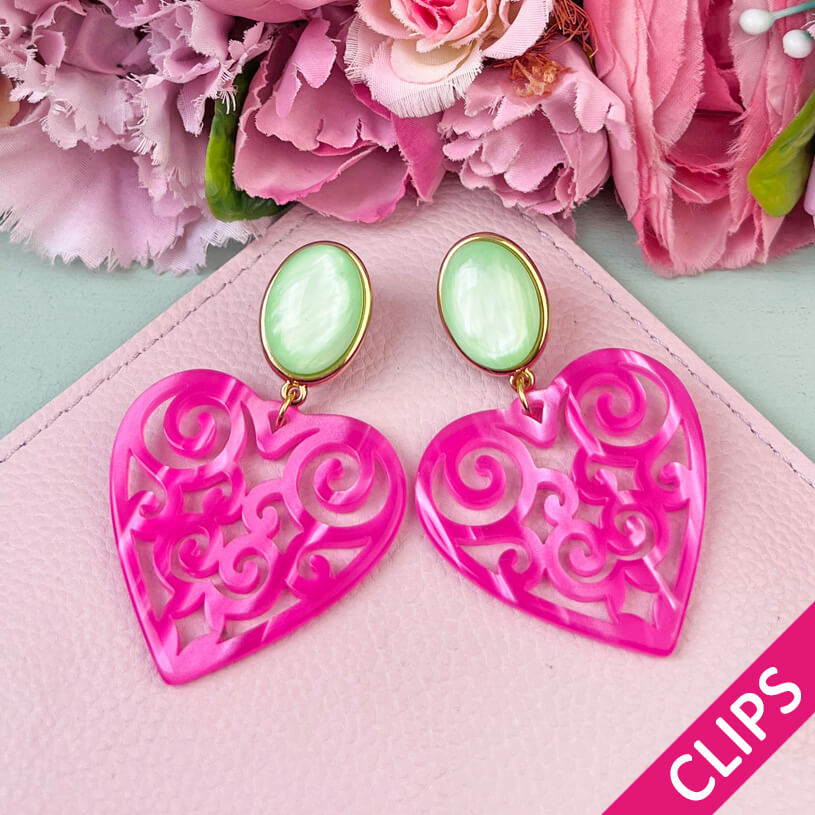 Schöne Herz-Ohrringe mit hellgrünem Ohrund Herz-Ornamenten in Pink