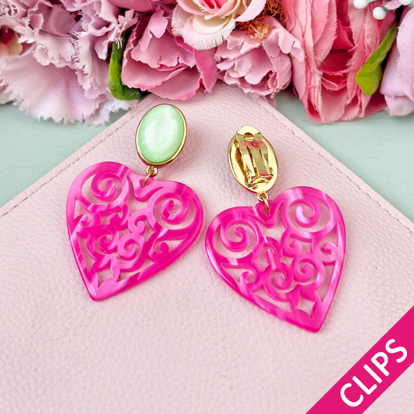 Schöne Herz-Ohrringe mit hellgrünem Ohrund Herz-Ornamenten in Pink