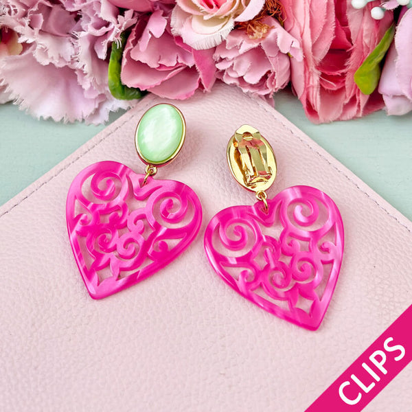 Schöne Herz-Ohrringe mit hellgrünem Ohrund Herz-Ornamenten in Pink