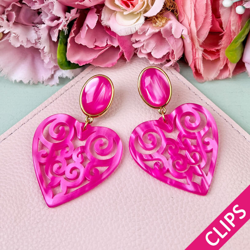 Schöne Herz-Ohrringe als Ohrmit Herz-Ornamenten in Pink von AmuseToi