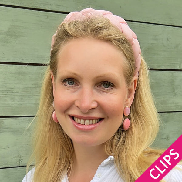 Rosafarbene Ohrclips mit pinkem Anhänger in Rochenhautoptik