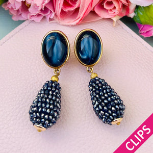 Blaue Ohrclips mit glitzerndem Tropfen von AmuseToi