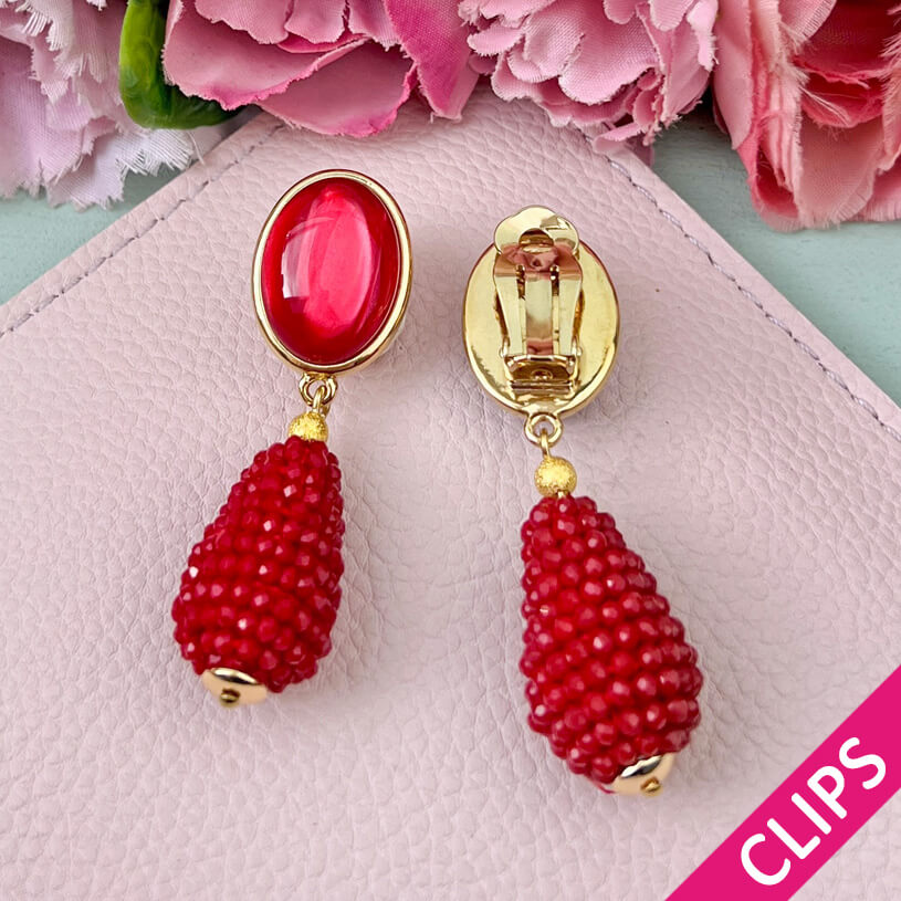 Rote Ohrringe als Clips mit glitzerndem Tropfen von AmuseToi