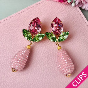 Funkelnde Ohrclips in Rosa und Grün mit glitzernden Tropfen
