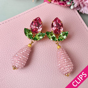 Funkelnde Ohrclips in Rosa und Grün mit glitzernden Tropfen
