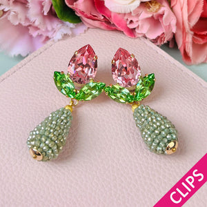 Funkelnde Ohrclips in Rosa und Grün mit glitzernden Tropfen in Hellgrün