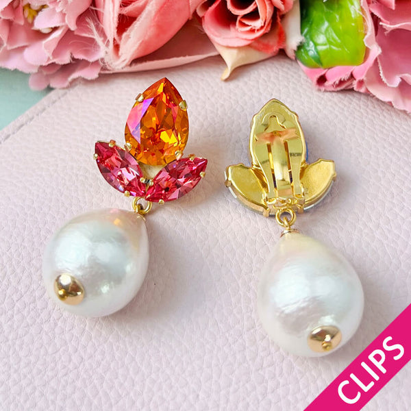 Funkelnde Ohrclips in Pink und Orange mit federleichten Baumwolltropfen