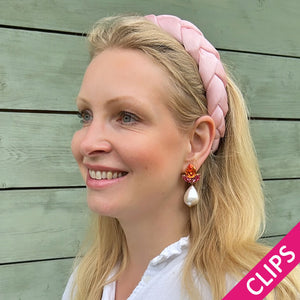 Funkelnde Ohrclips in Pink und Orange mit federleichten Baumwolltropfen
