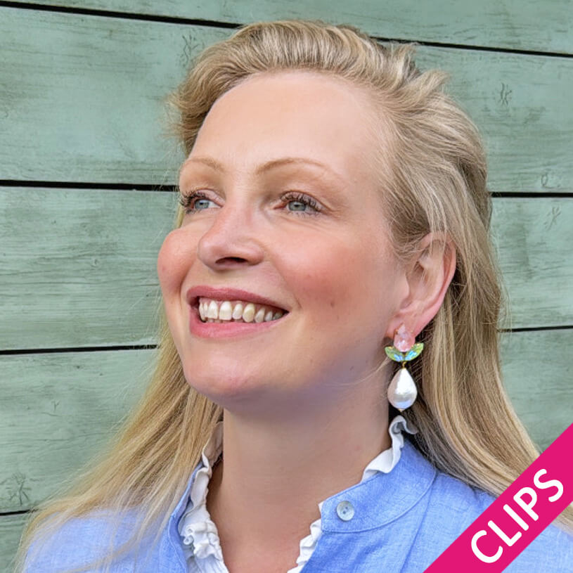 Funkelnde Ohrclips in Rosa und Hellgrün mit federleichten Baumwolltropfen