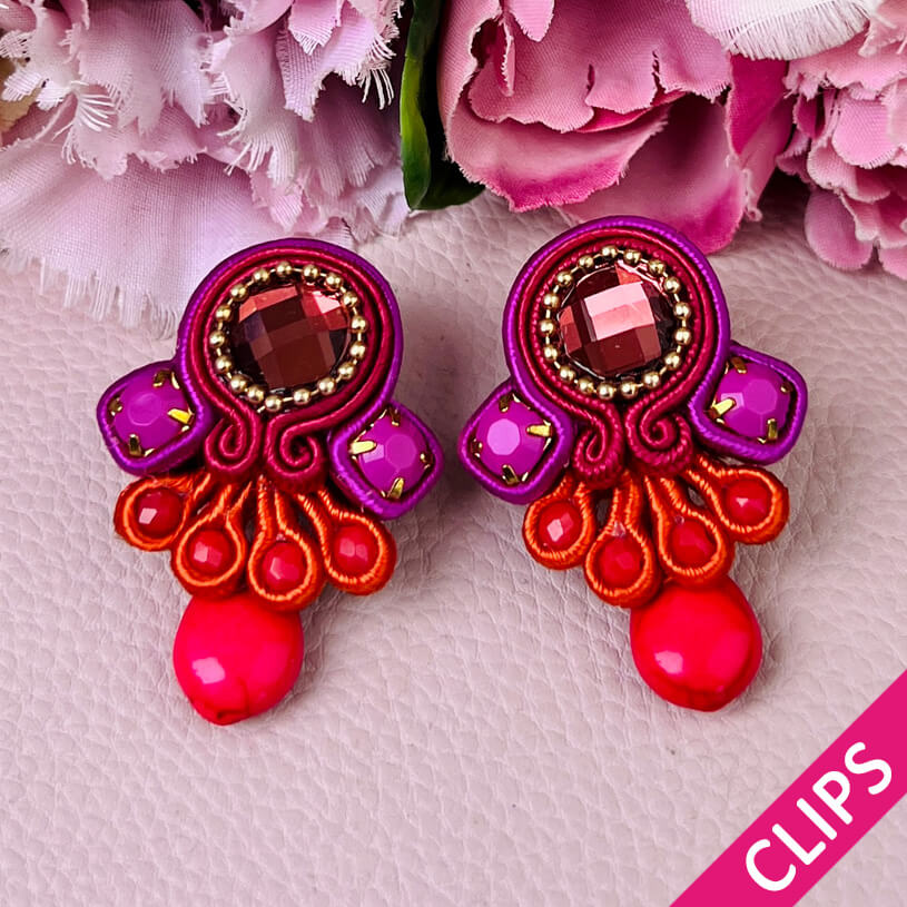 Farbenfrohe Statement-Ohrclips in Pink und Orange