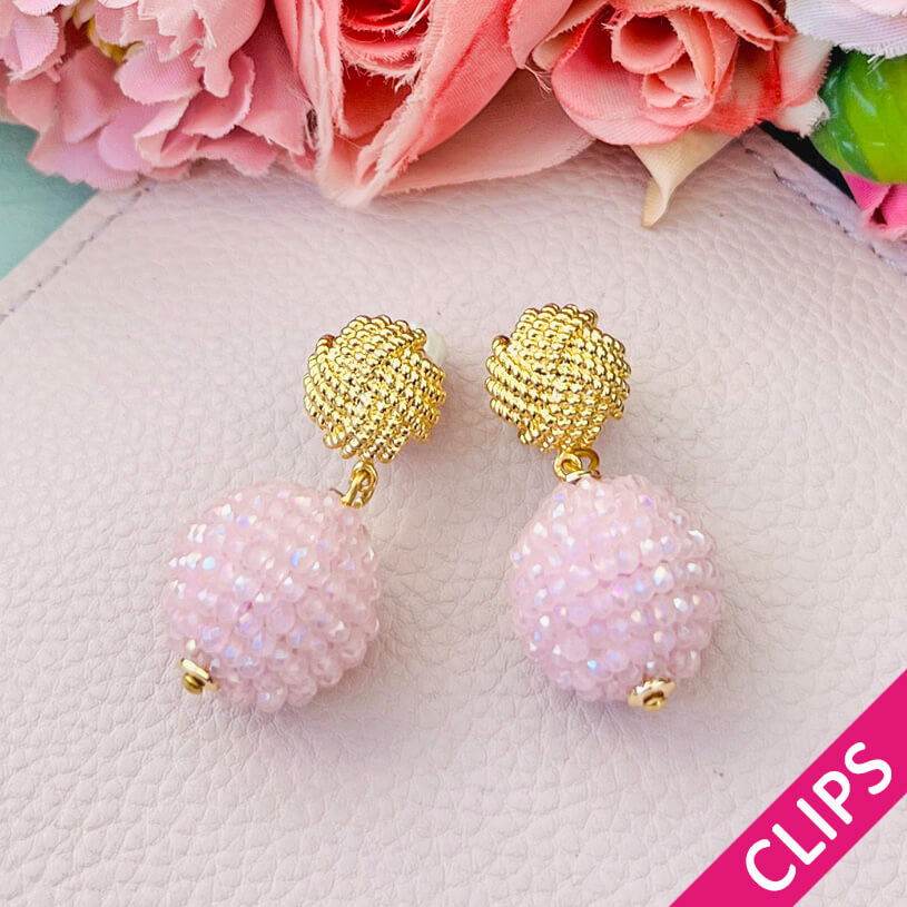 Vergoldete Knoten-Ohrclips mit funkelnden Kugeln in Rosa