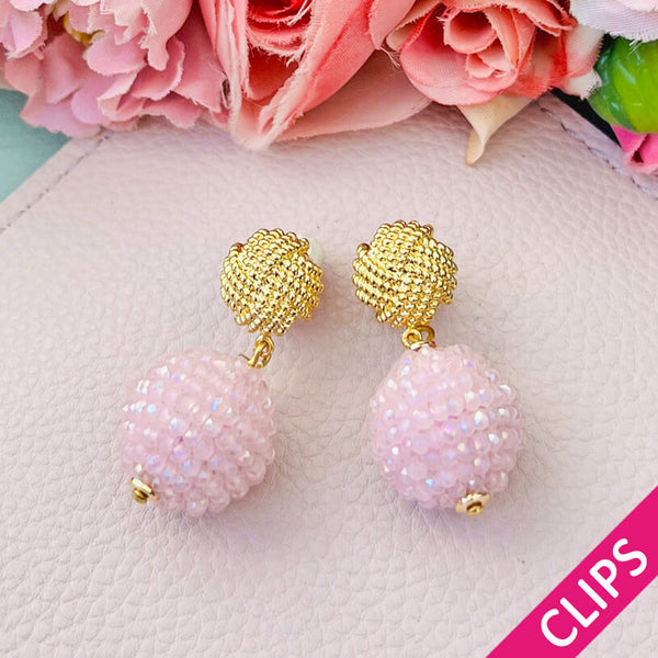 Vergoldete Knoten-Ohrclips mit funkelnden Kugeln in Rosa