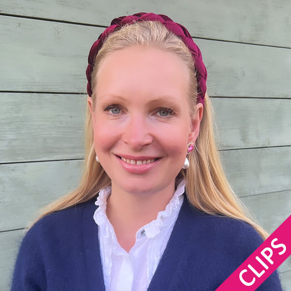 Edel funkelnde Ohrclips in Pink mit leichtem Baumwolltropfen