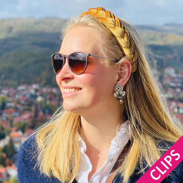 Gold und Silber glänzende Statement-Ohrclips mit Glitzer-Tropfen