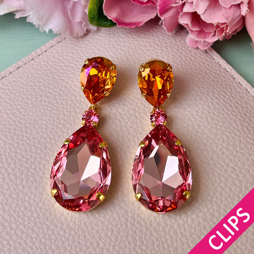 Funkelnde Ohrclips mit Glas-Kristallen in Orange und Rosa