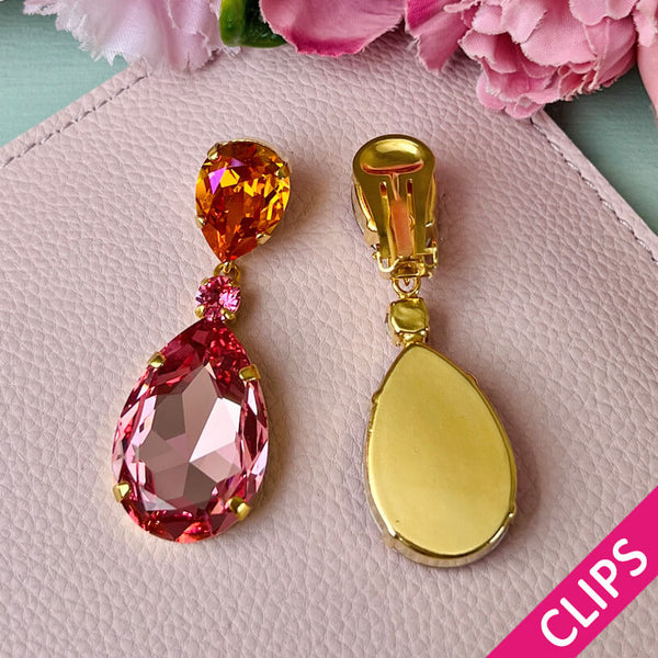 Funkelnde Ohrclips mit Glas-Kristallen in Orange und Rosa