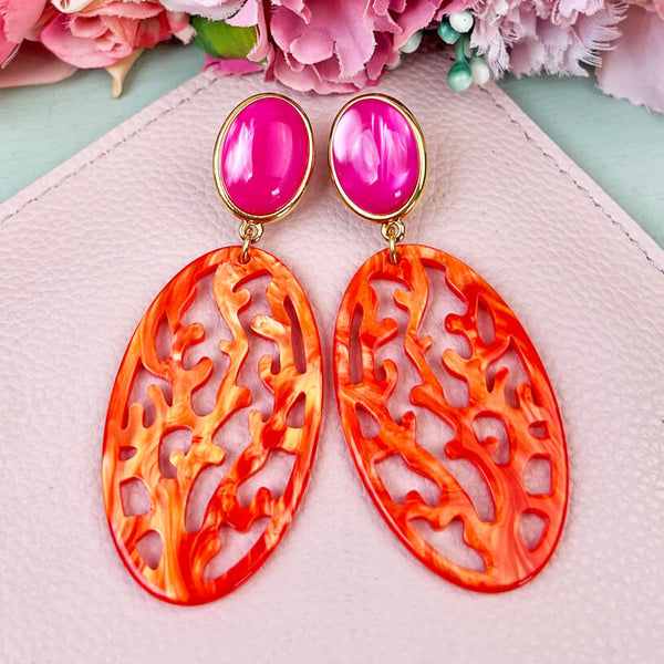 Pinkfarbene Ohrstecker mit orangem Oval in Korallenoptik