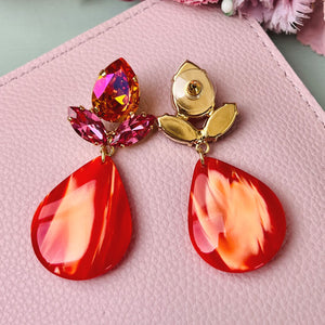 Funkelnde Ohrstecker in Pink und Orange mit großem Tropfen