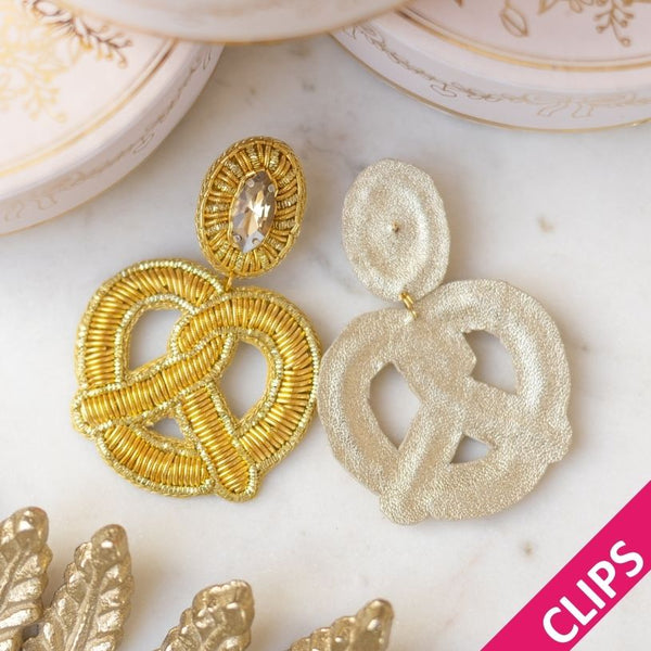 Auffällige Soutacheohrclips als goldene Bretzel