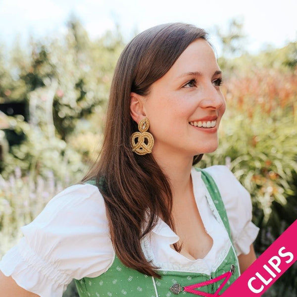 Auffällige Soutacheohrclips als goldene Bretzel