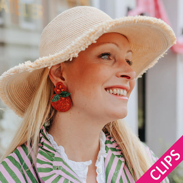 Auffällige Soutacheohrclips als Orange