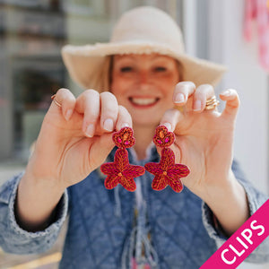 Auffällige Soutacheohrclips als pink-oranger Seestern