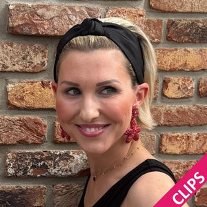 Auffällige Soutacheohrclips als pink-oranger Seestern