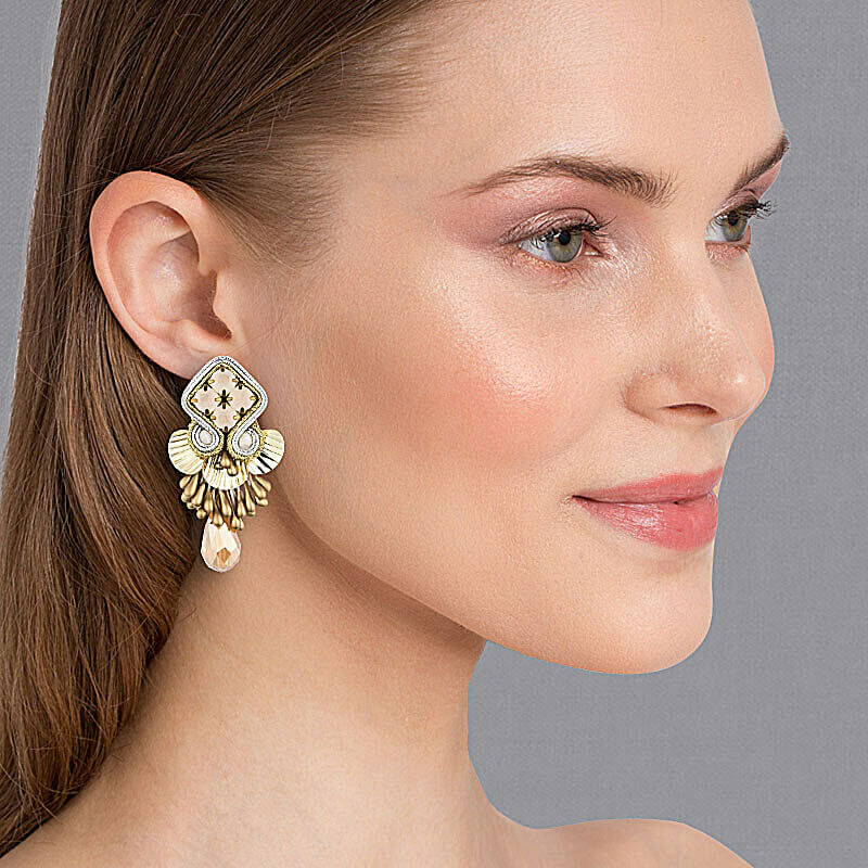 Gold und Silber glänzende Statement-Ohrringe mit Glitzer-Tropfen als Ohrclips